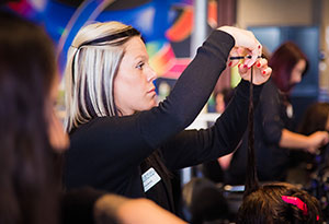 Woman Getting Hair Cut at Salon